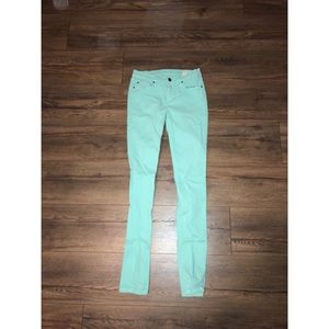 Mint colored skinny jeans